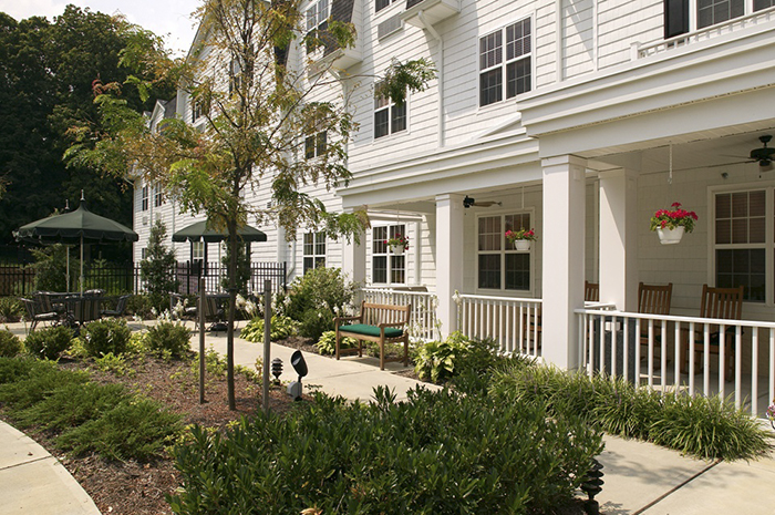 Brightview Catonsville Exterior Porch with Garden - Maryland Senior Living