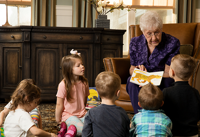 Brightview Senior Living Resident Reading to Grandchildren